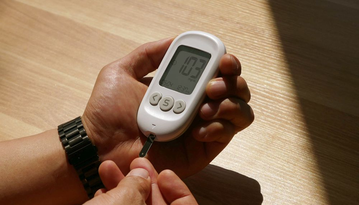 Checking feet daily for diabetic foot health